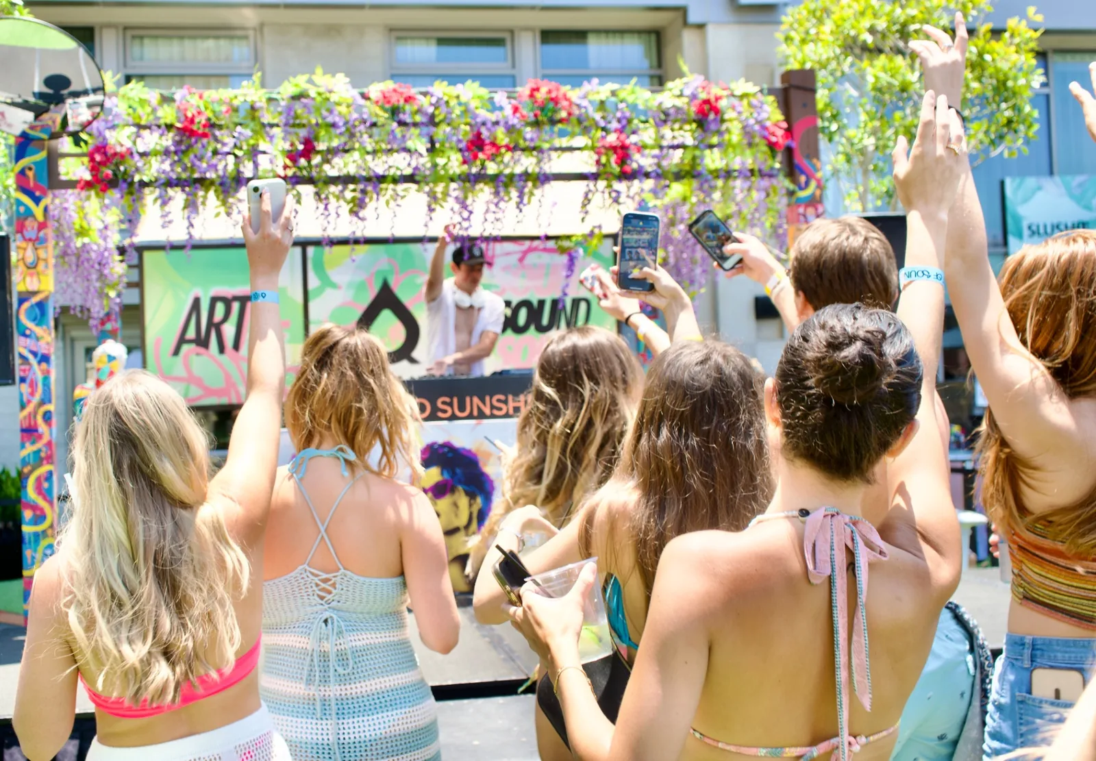 Daytime crowd dancing at a BOJAK event